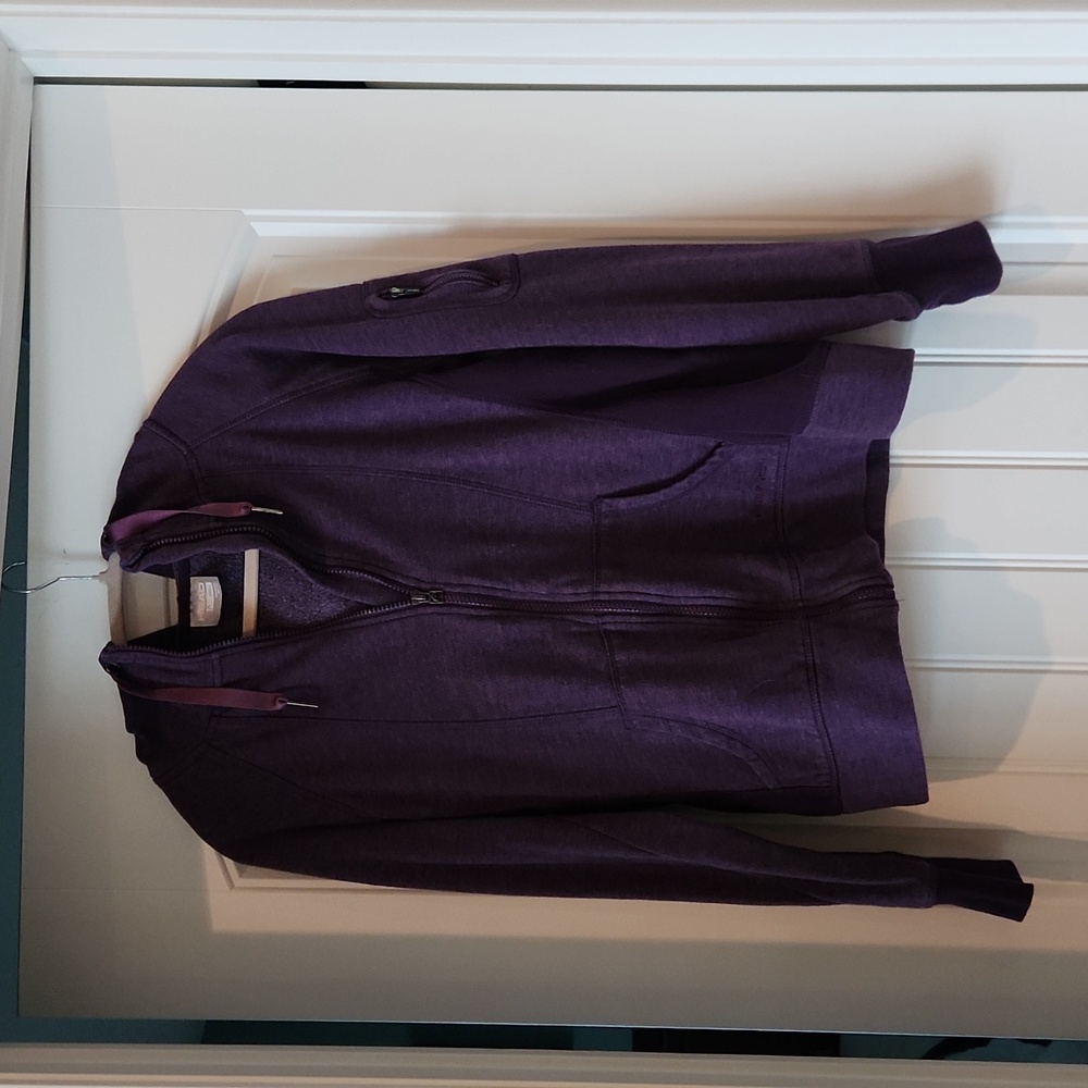 Head track suit. Purple, hooded, with matching purple and black leggings.